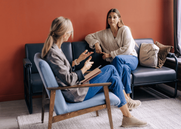 teen with PTSD talking to therapist