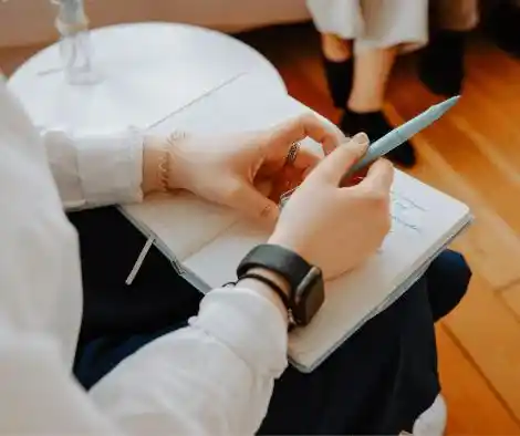 therapist writing notes